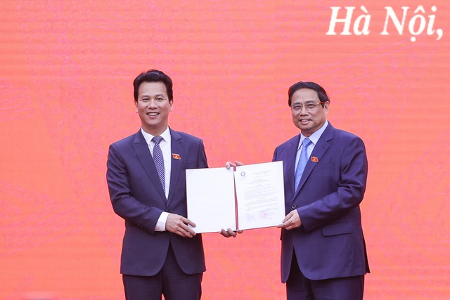 Thủ tướng Phạm Minh Chính trao quyết định và giao trọng trách cho tân Bộ trưởng Đặng Quốc khánh - Ảnh 1.
