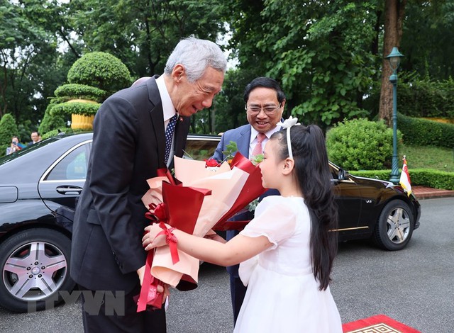 Thủ tướng Phạm Minh Chính chủ trì lễ đón Thủ tướng Singapore Lý Hiển Long - Ảnh 4.