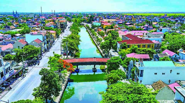 Hợp nhất thành phố Ninh Bình với huyện Hoa Lư xây dựng 'Đô thị Cố đô - Di sản' - Ảnh 4.