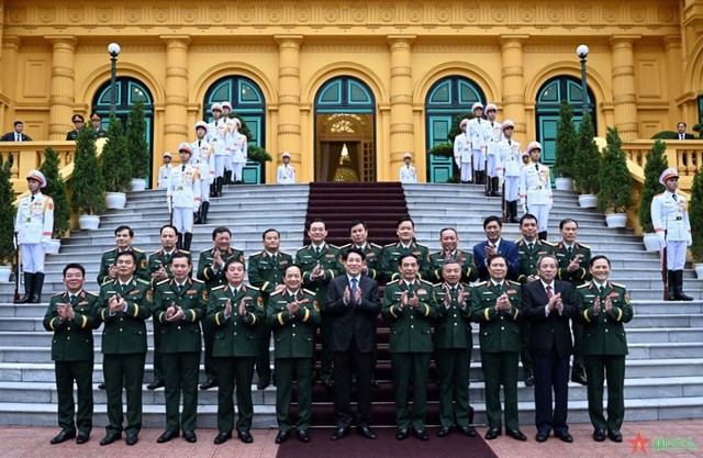 Chủ tịch nước Lương Cường trao quyết định thăng quân hàm Thượng tướng đối với đồng chí Lê Quang Minh- Ảnh 4.