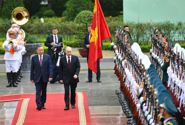 Chủ tịch nước Tô Lâm chủ trì lễ đón chính thức Tổng thống Liên bang Nga Vladimir Putin- Ảnh 1.